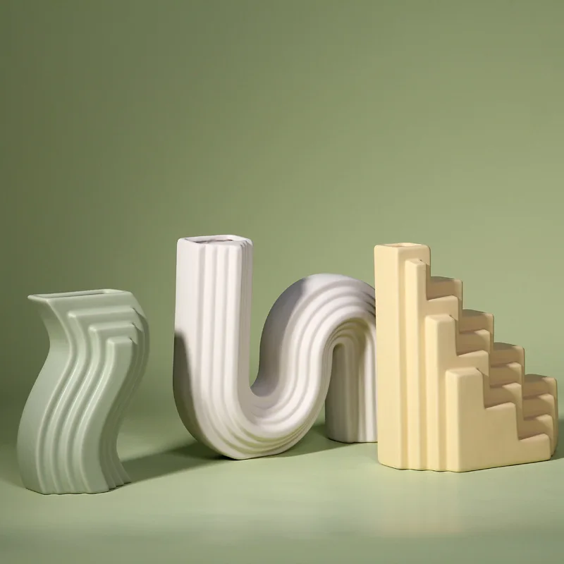 Art trend geometric ceramic art vase modern minimalist living room TV cabinet designer creative decorative flower arrangement
Art trend geometric ceramic art vase modern minimalist living room TV cabinet designer creative decorative flower arrangement