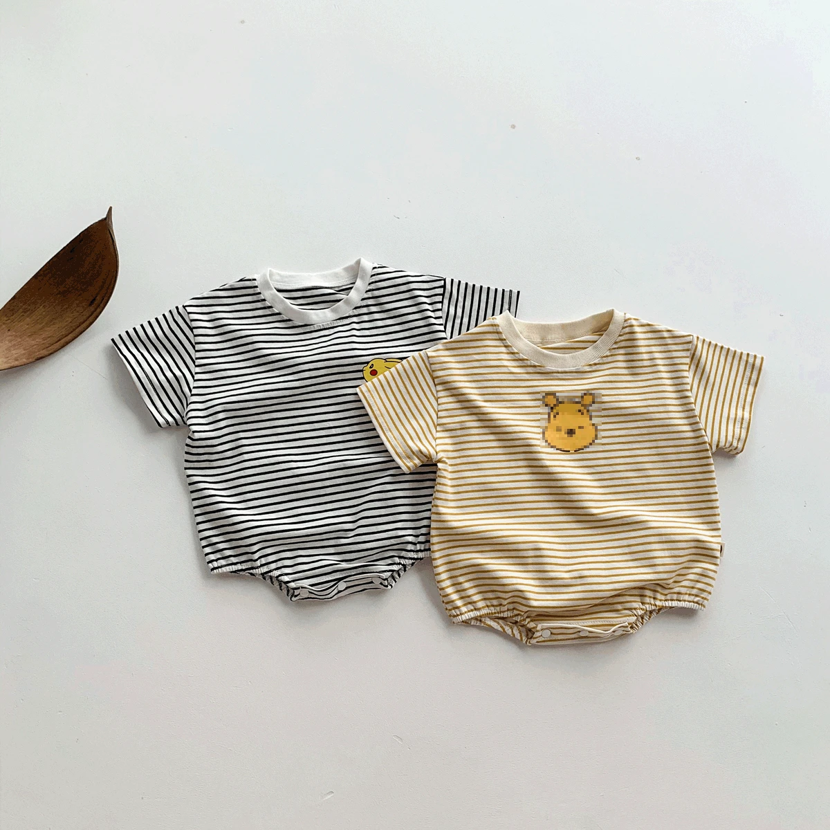 Baby summer short-sleeved striped jumpsuit for men and women baby loose casual triangle bag fart romper
Baby summer short-sleeved striped jumpsuit for men and women baby loose casual triangle bag fart romper