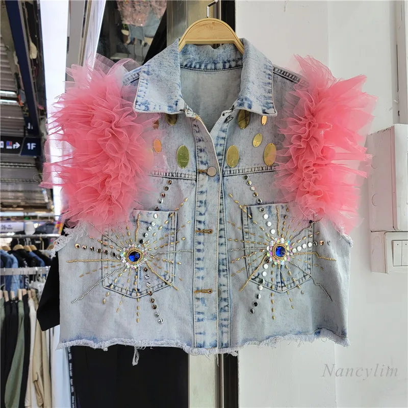 2022 Spring and Summer Vest Femme New Mesh Edge Sleeveless Denim Jacket Short Coat Fashion Bead Waistcoat Girls Ladies
2022 Spring and Summer Vest Femme New Mesh Edge Sleeveless Denim Jacket Short Coat Fashion Bead Waistcoat Girls Ladies