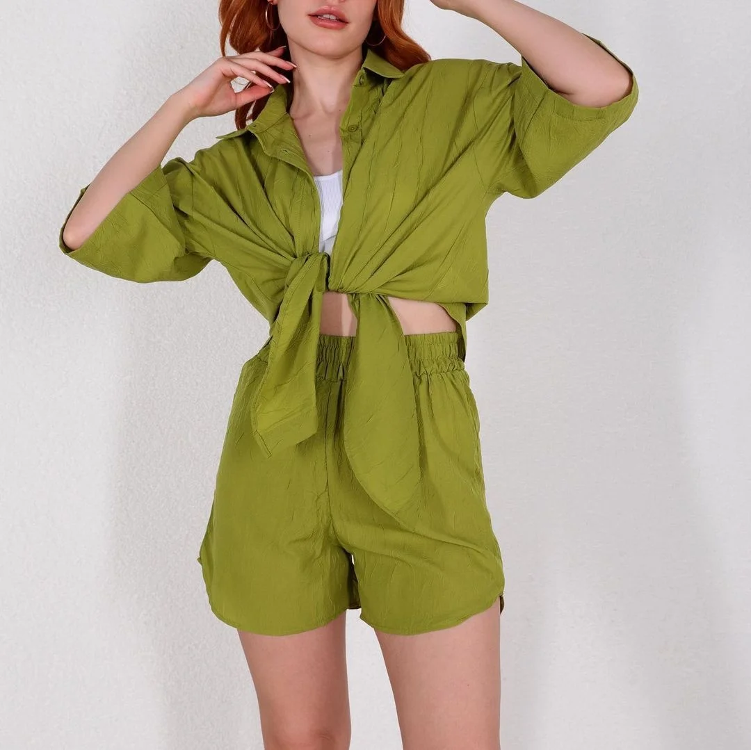 2023 New Women's Casual Wrinkle Collar Single breasted Short Sleeve Shirt High Waist Shorts Two Piece Set
2023 New Women's Casual Wrinkle Collar Single breasted Short Sleeve Shirt High Waist Shorts Two Piece Set