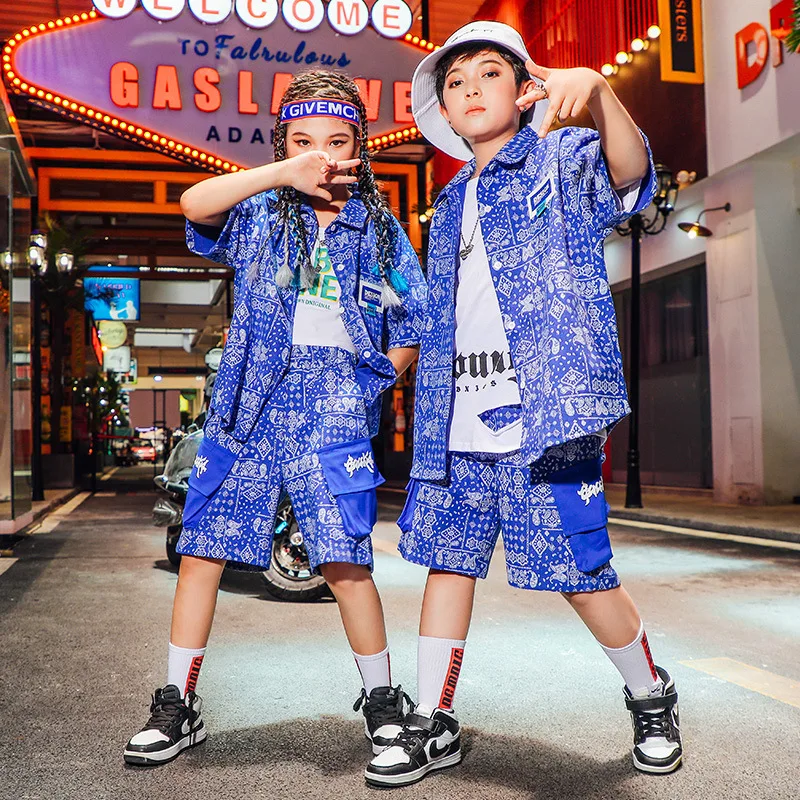 Teen Girls Clothes Lapel Print Shirt Jacket Pocket Patchwork Design Shorts 2pcs Boy Streetwear Street Dance Performance Costumes
Teen Girls Clothes Lapel Print Shirt Jacket Pocket Patchwork Design Shorts 2pcs Boy Streetwear Street Dance Performance Costumes