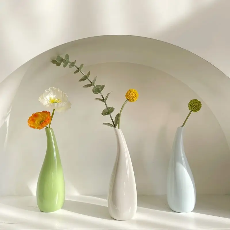 Nordic ceramic vase dried flower flower arrangement vase living room dining table home decoration ornaments photo props
Nordic ceramic vase dried flower flower arrangement vase living room dining table home decoration ornaments photo props