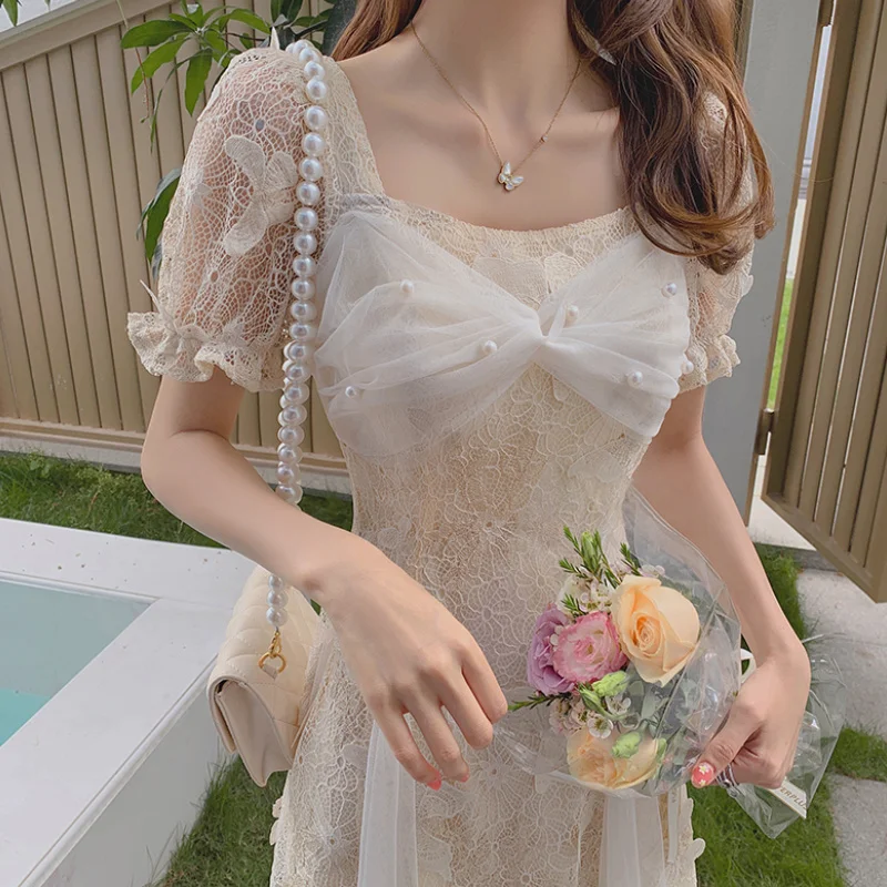 Korean Women Lace Fairy Elegant Midi Dress Summer Patchwork Woman Floral Party Dresses Ladeis Casual Puff Sleeve One-piece Dress 
Korean Women Lace Fairy Elegant Midi Dress Summer Patchwork Woman Floral Party Dresses Ladeis Casual Puff Sleeve One-piece Dress