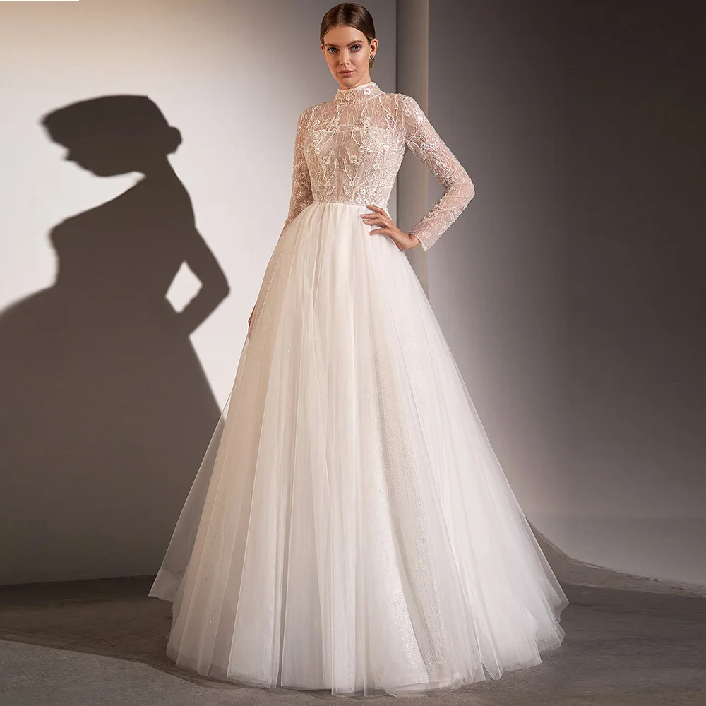 Elegant Wedding Dress Ball Gown High Collar Long Sleeves Lace Wedding Gowns Sweep Train Beaded Applique Illusion Bridal Dresses
Elegant Wedding Dress Ball Gown High Collar Long Sleeves Lace Wedding Gowns Sweep Train Beaded Applique Illusion Bridal Dresses