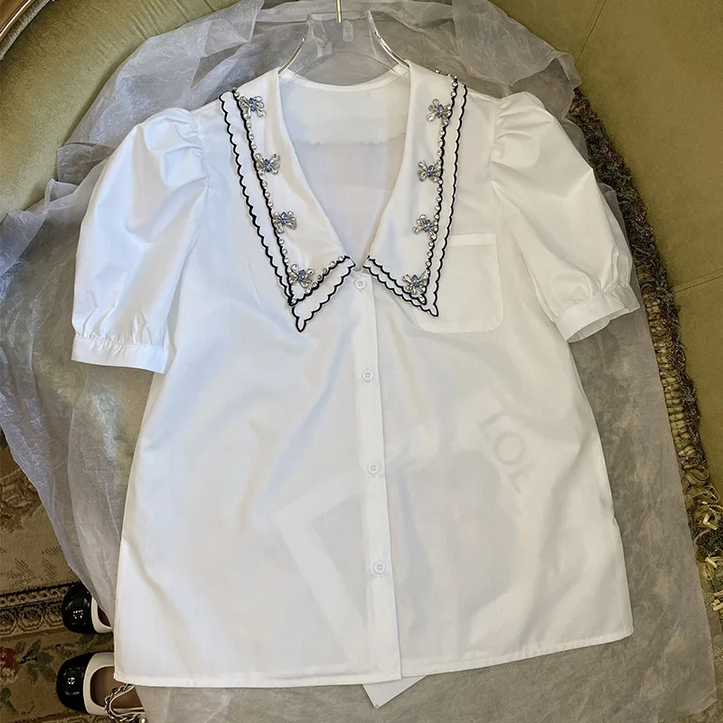 Fashion Tide Designer New Beaded Embroidered Top White Shirt Doll Collar Short Sleeve Button Blouses Brand Women Clothing
Fashion Tide Designer New Beaded Embroidered Top White Shirt Doll Collar Short Sleeve Button Blouses Brand Women Clothing