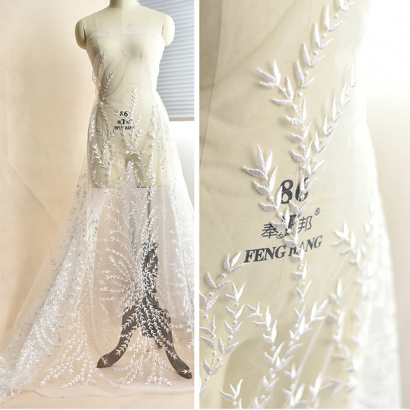 Branches and leaves embroidery lace fabric wedding dress decoration high-end cloth handmade DIY accessories ivory white
Branches and leaves embroidery lace fabric wedding dress decoration high-end cloth handmade DIY accessories ivory white