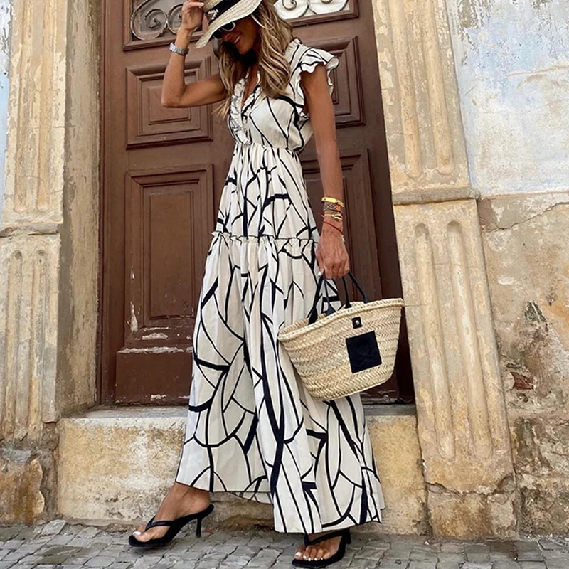 2023 Summer Boho Fashion Sleeveless Ruffle Side Long Dress Women Casual V-Neck Waist Dress Ladies Commuter Loose Pleated Dresses
2023 Summer Boho Fashion Sleeveless Ruffle Side Long Dress Women Casual V-Neck Waist Dress Ladies Commuter Loose Pleated Dresses