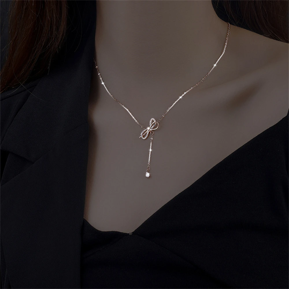 925 Sterling Silver Line Clavicle Necklace Tassel Bow Chain Zirconia Necklace for Women Fine Korean Bow Knot Pendant Necklace 
925 Sterling Silver Line Clavicle Necklace Tassel Bow Chain Zirconia Necklace for Women Fine Korean Bow Knot Pendant Necklace