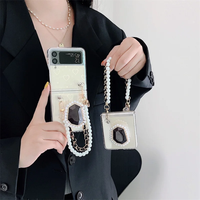 Cute Pearl Bracelet Phone Case For Samsung Galaxy Z Flip3 Hard Clear Laser Cover Holder For ZFlip1 Flip2 Protective Shell Chain
Cute Pearl Bracelet Phone Case For Samsung Galaxy Z Flip3 Hard Clear Laser Cover Holder For ZFlip1 Flip2 Protective Shell Chain