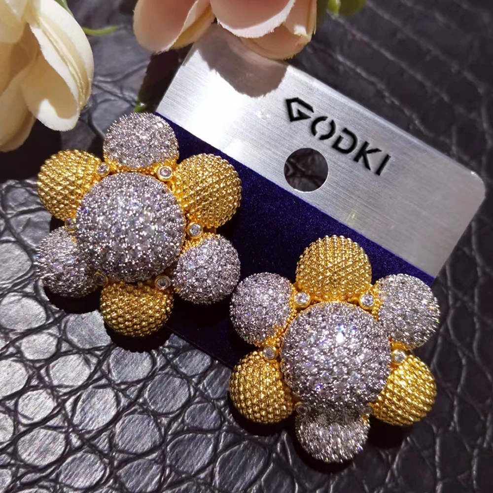 GODKI Lovely African Sun Flower Stud Earrings For Women Cubic Zirconia Crystal CZ Statement Stud Earring Brincos Bijoux 2023
GODKI Lovely African Sun Flower Stud Earrings For Women Cubic Zirconia Crystal CZ Statement Stud Earring Brincos Bijoux 2023