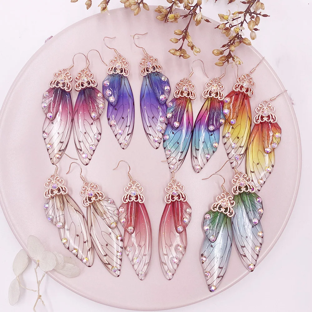 Minar Fairy Rainbow Gradient Resin Cicada Wings Drop Earrings for Women Rhinestone Sequins Butterfly Earrings Wedding Jewelry
Minar Fairy Rainbow Gradient Resin Cicada Wings Drop Earrings for Women Rhinestone Sequins Butterfly Earrings Wedding Jewelry
