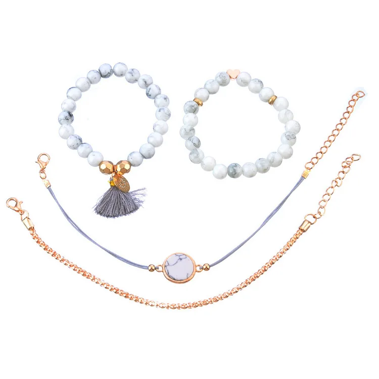 Hand Jewelry European and American turquoise tassel trend women's beaded disc bracelet four-piece set
Hand Jewelry European and American turquoise tassel trend women's beaded disc bracelet four-piece set