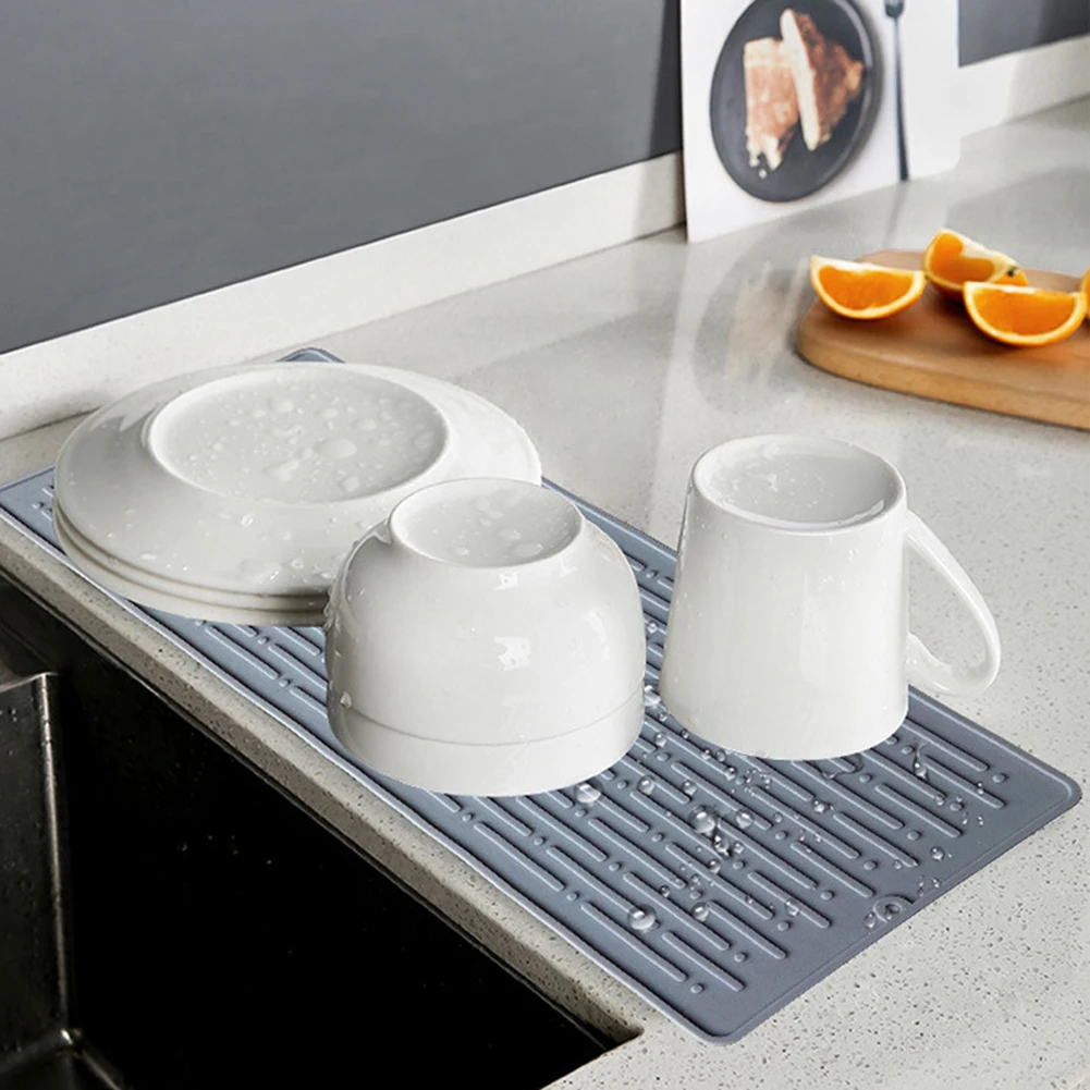 Foldable Silicone Dish Drying Mat for kitchen Sink Protection Mat Table Dishes Drain Mat Home Mildew proof Mat коврик для посуды
Foldable Silicone Dish Drying Mat for kitchen Sink Protection Mat Table Dishes Drain Mat Home Mildew proof Mat коврик для посуды