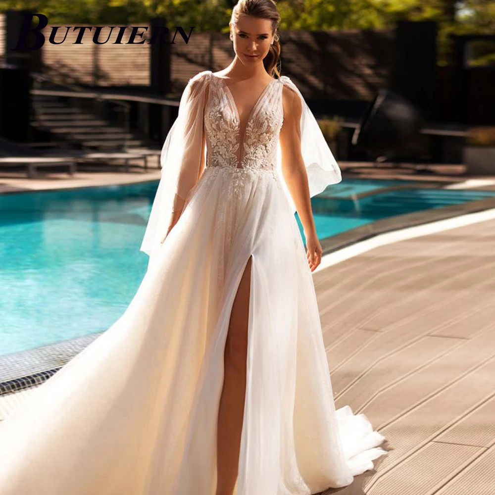 COZOK Sexy Appliques Wedding Dress V-neck Lace Aline High Slit Bridal Gown Backless Design With Court Train Custom Made
COZOK Sexy Appliques Wedding Dress V-neck Lace Aline High Slit Bridal Gown Backless Design With Court Train Custom Made