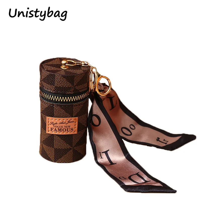 Unistybag Mini сумки для помады роскошная кожаная сумка-ведро Изысканная сумка для хранения автомобильный брелок женский брелок для ключей в подарок
Unistybag Mini сумки для помады роскошная кожаная сумка-ведро Изысканная сумка для хранения автомобильный брелок женский брелок для ключей в подарок