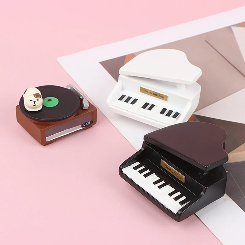 1PC 1:12 Dollhouse Miniature Resin Piano Cute Cat Record Player Mini Musical Instruments Model Toys for Doll House Decor
1PC 1:12 Dollhouse Miniature Resin Piano Cute Cat Record Player Mini Musical Instruments Model Toys for Doll House Decor