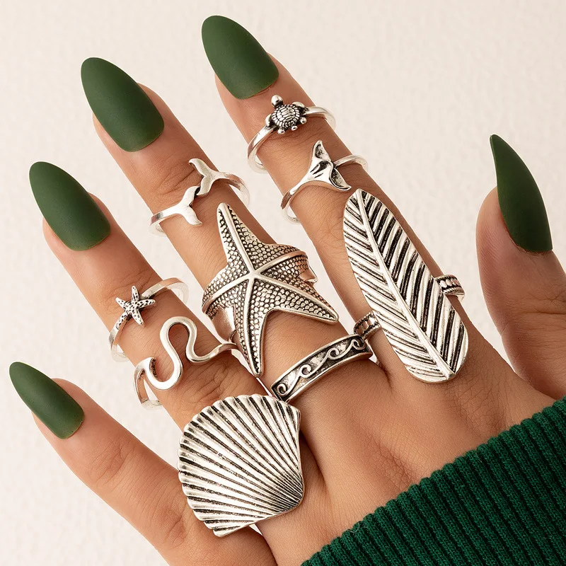 

Boho New Metal Personality Ring Set 9-piece Retro Flower Butterfly Starfish Tortoise Joint Ring for Women Fashion Jewelry Gifts