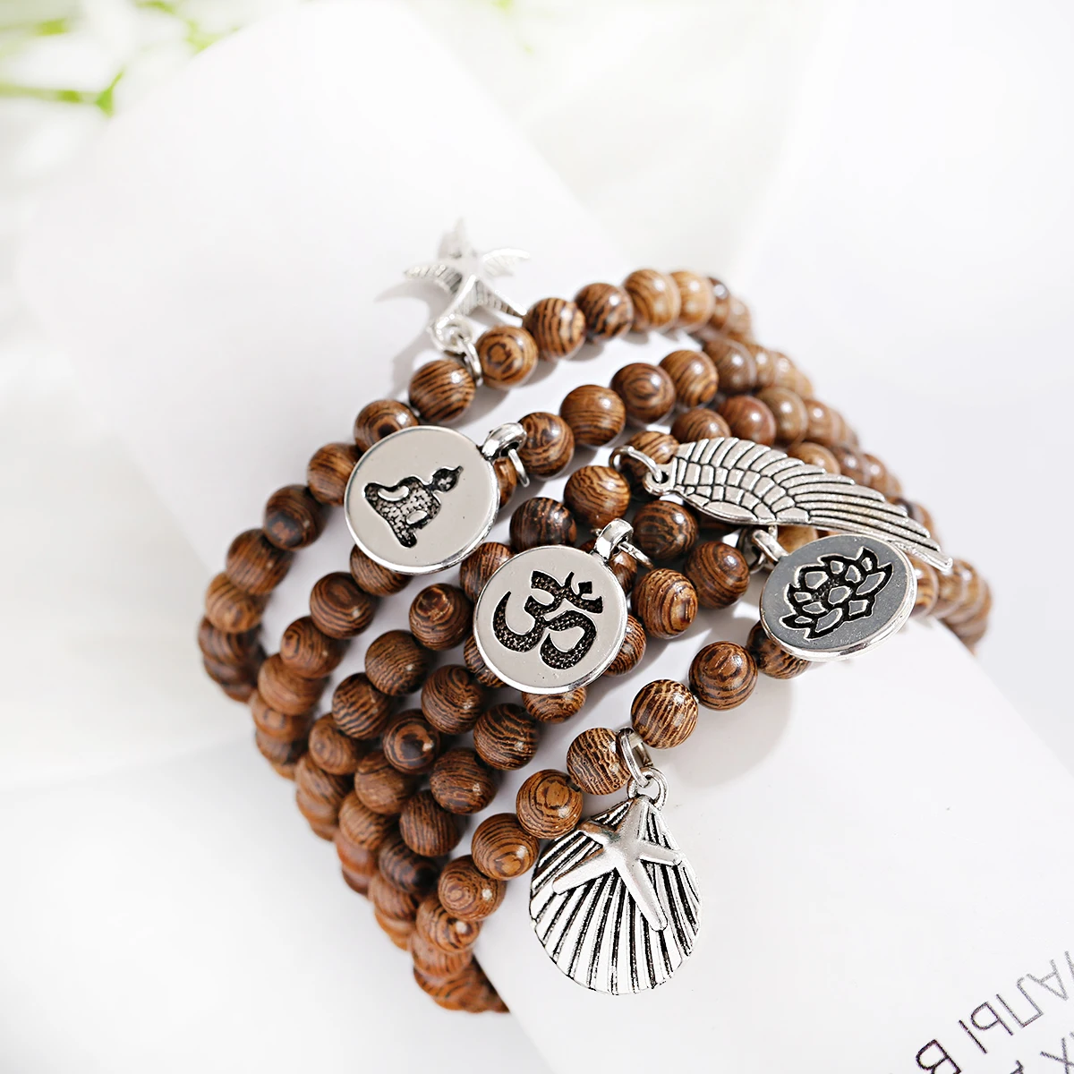 6mm Wood Beads Alloy Lotus Feather Pendant OM Bracelet Tibetan Buddhist Mala Charm Rosary Bracelet Yoga Wooden Women Men Jewelry 
6mm Wood Beads Alloy Lotus Feather Pendant OM Bracelet Tibetan Buddhist Mala Charm Rosary Bracelet Yoga Wooden Women Men Jewelry