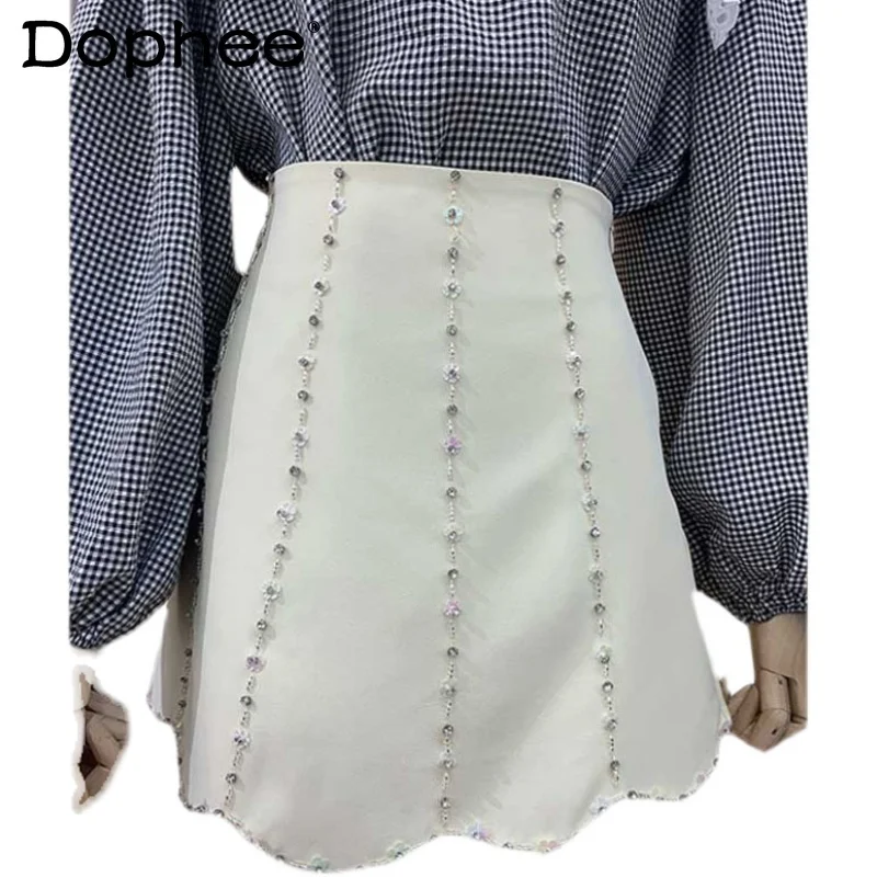 Korean Chic Beaded Three-Dimensional Sequined White A-line Short Skirt Women High Waist Mini Skirt 2022 Summer New Mujer Faldas
Korean Chic Beaded Three-Dimensional Sequined White A-line Short Skirt Women High Waist Mini Skirt 2022 Summer New Mujer Faldas