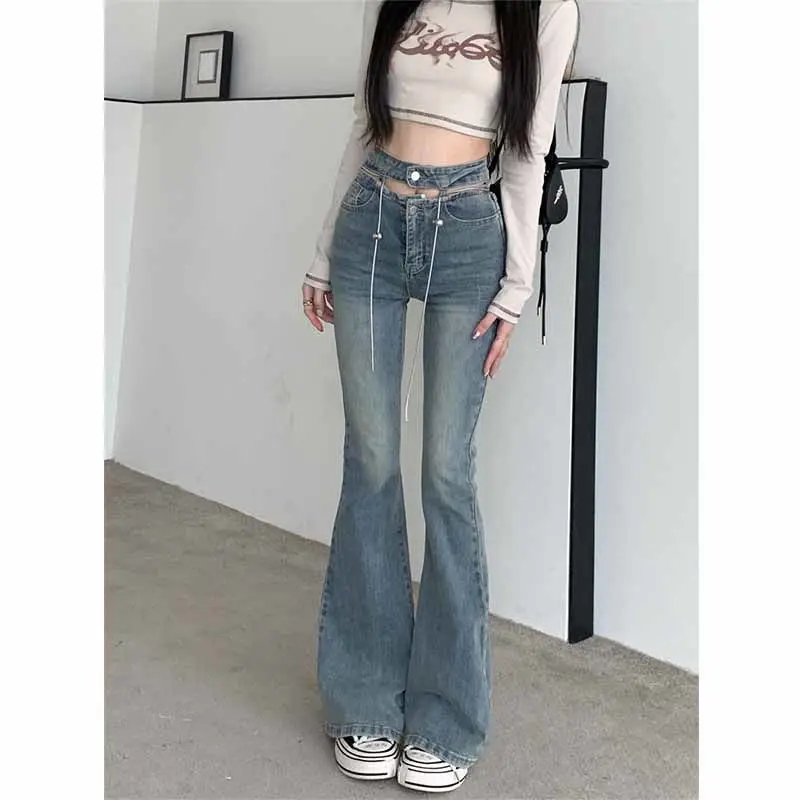 High-waisted Hollow Slim Jeans Fashionable Design Zipper Hot Pants Retro Floor-Making Slightly Flared Long Pants Women's Autumn
High-waisted Hollow Slim Jeans Fashionable Design Zipper Hot Pants Retro Floor-Making Slightly Flared Long Pants Women's Autumn