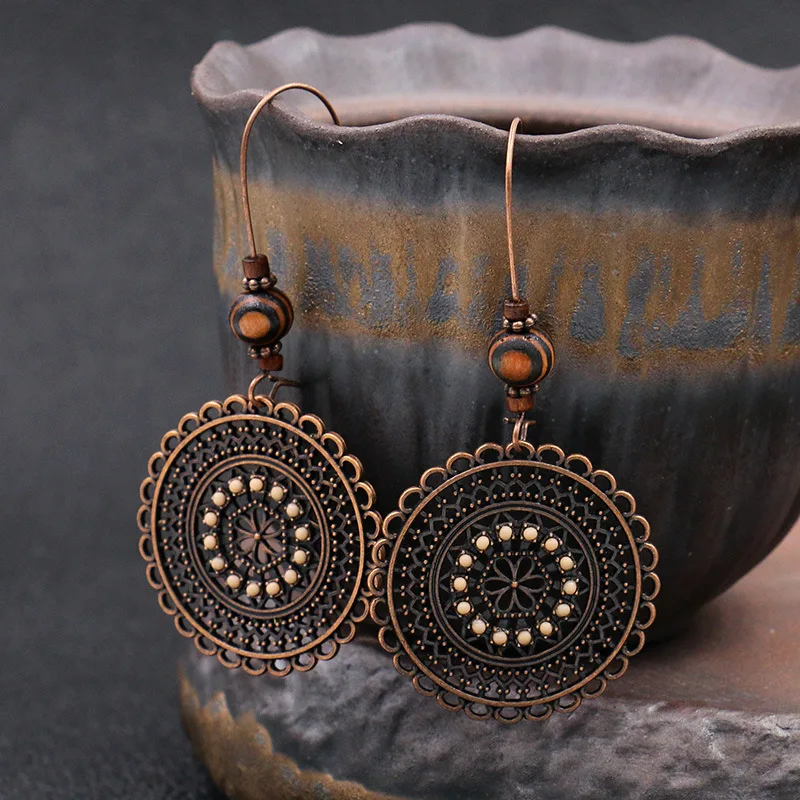 Boho Gypsy Ethnic Round Alloy Hollow Earrings Indian Jewelry Vintage Wood Beads Hanging Earrings For Women
Boho Gypsy Ethnic Round Alloy Hollow Earrings Indian Jewelry Vintage Wood Beads Hanging Earrings For Women