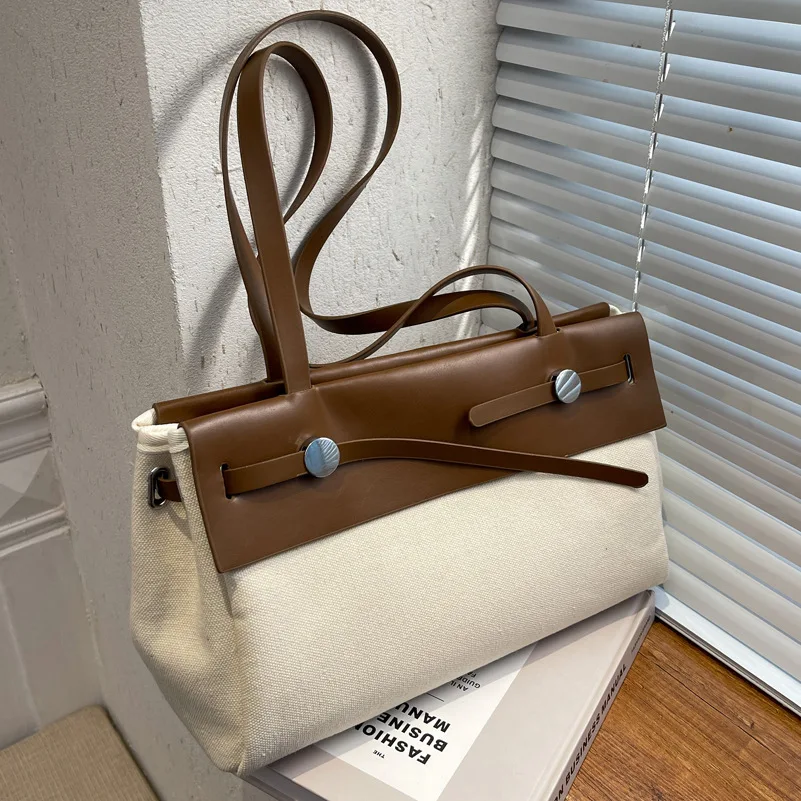 High-quality Ladies Large-capacity Canvas Shoulder Bag 2021 Autumn and Winter New Fashion Stitching Commuter Bag Messenger Bag
High-quality Ladies Large-capacity Canvas Shoulder Bag 2021 Autumn and Winter New Fashion Stitching Commuter Bag Messenger Bag