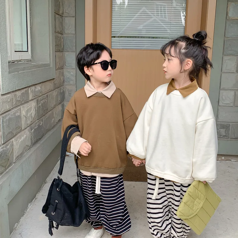 Autumn Kids sweatshirts Korean solid color Tops Boys and Girls cotton O-Neck loose pullovers
Autumn Kids sweatshirts Korean solid color Tops Boys and Girls cotton O-Neck loose pullovers
