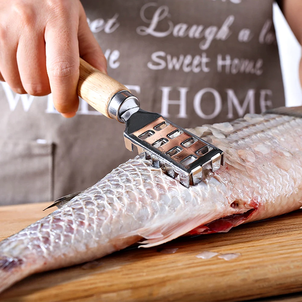 Fish Scaler Brush Fish Scaler Remover Stainless Steel Sawtooth Fish Scales with Wood Handle-Cleaning Brush Scraper Kitchen Tool
Fish Scaler Brush Fish Scaler Remover Stainless Steel Sawtooth Fish Scales with Wood Handle-Cleaning Brush Scraper Kitchen Tool