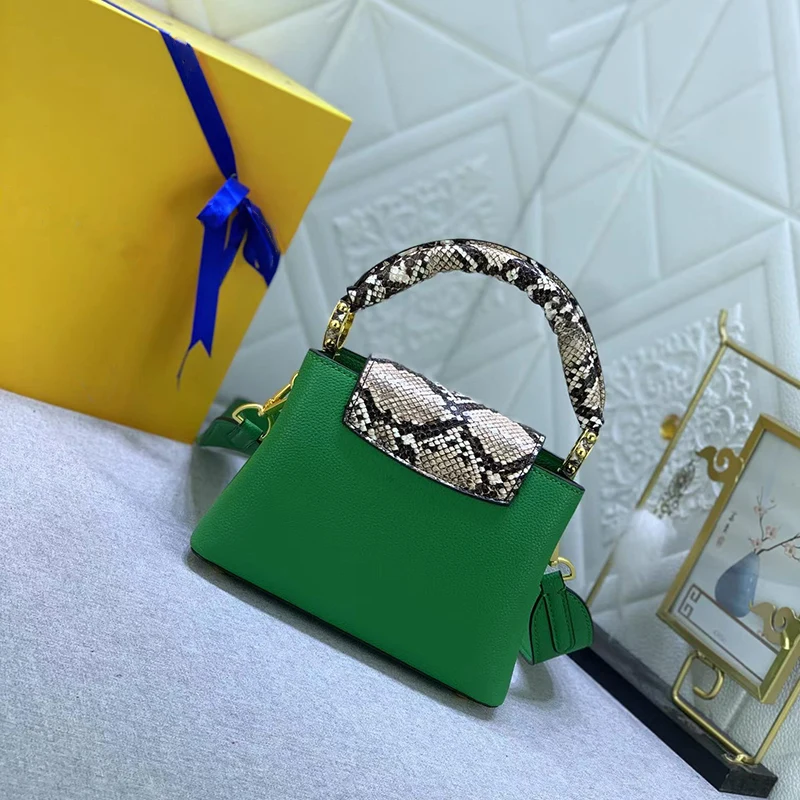 2023 new fashion temperament handbag python leather wrapped handle flip bag high quality metal accessories Crossbody bag
2023 new fashion temperament handbag python leather wrapped handle flip bag high quality metal accessories Crossbody bag