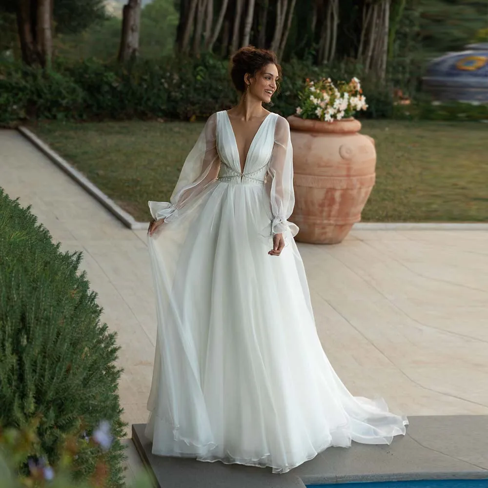 Modern Wedding Dresses 2022 New Ice Tulle Beading Bride Dress Deep V-Neck Zipper Long Sleeve A-Line Bridal Gown For Women Custom
Modern Wedding Dresses 2022 New Ice Tulle Beading Bride Dress Deep V-Neck Zipper Long Sleeve A-Line Bridal Gown For Women Custom