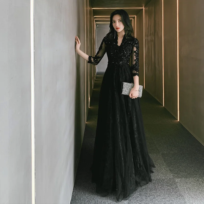 Платье женское вечернее черное ТРАПЕЦИЕВИДНОЕ с открытой спиной, рукавом 3/4 и V-образным вырезом 
Платье женское вечернее черное ТРАПЕЦИЕВИДНОЕ с открытой спиной, рукавом 3/4 и V-образным вырезом