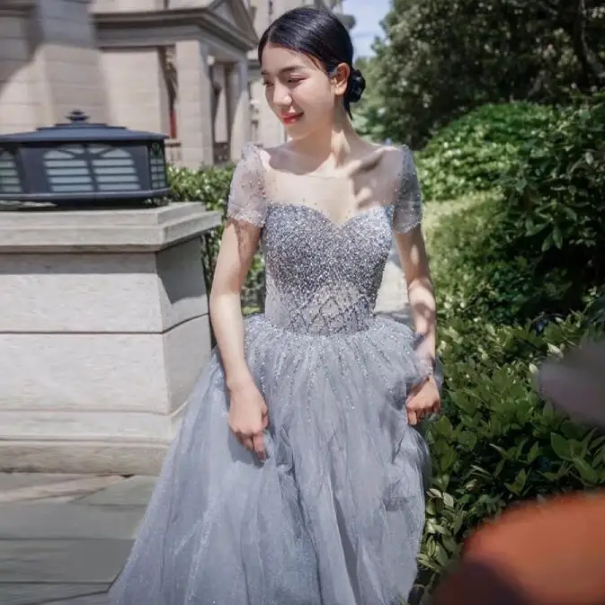 2022 Blue A-Line Cocktail Dresses Beadings Illusion Zipper Sequined Tulle O Neck Evening Party Charming Gowns For Wedding New
2022 Blue A-Line Cocktail Dresses Beadings Illusion Zipper Sequined Tulle O Neck Evening Party Charming Gowns For Wedding New