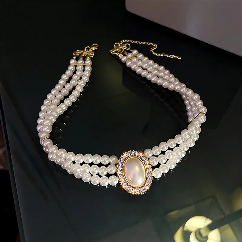 Multi-layer pearl diamond necklace collarbone chain design sense net red rhinestone short necklace Korean temperament
Multi-layer pearl diamond necklace collarbone chain design sense net red rhinestone short necklace Korean temperament
