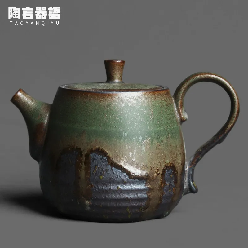 Vintage pottery bronze celadon hand-held teapot kiln baking glaze craft kung fu tea ceremony hand-held tea maker single pot
Vintage pottery bronze celadon hand-held teapot kiln baking glaze craft kung fu tea ceremony hand-held tea maker single pot
