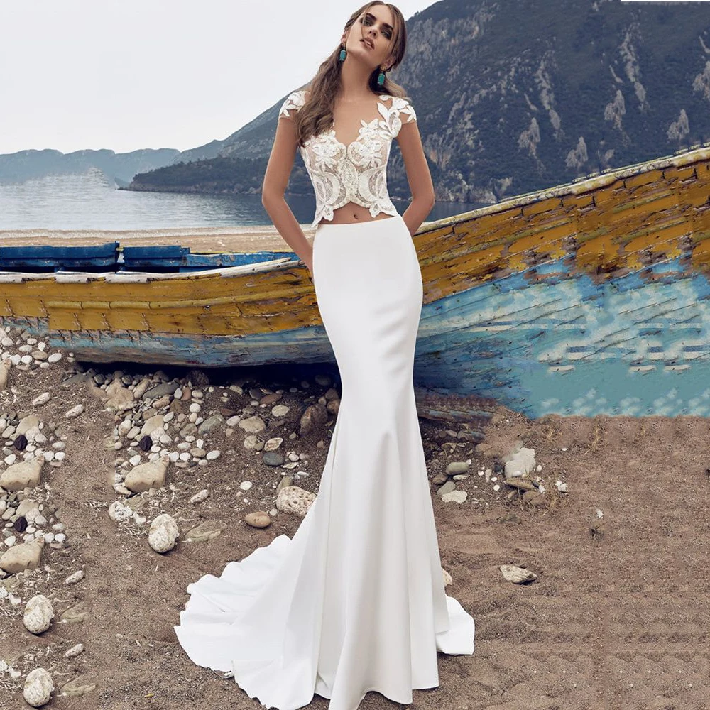 Sexy Two Piece Mermaid Wedding Dress 2022 Lace Appliques Sleeveless V Neck Sweep Train For Women Bridal Gown Vestidos De Noiva
Sexy Two Piece Mermaid Wedding Dress 2022 Lace Appliques Sleeveless V Neck Sweep Train For Women Bridal Gown Vestidos De Noiva