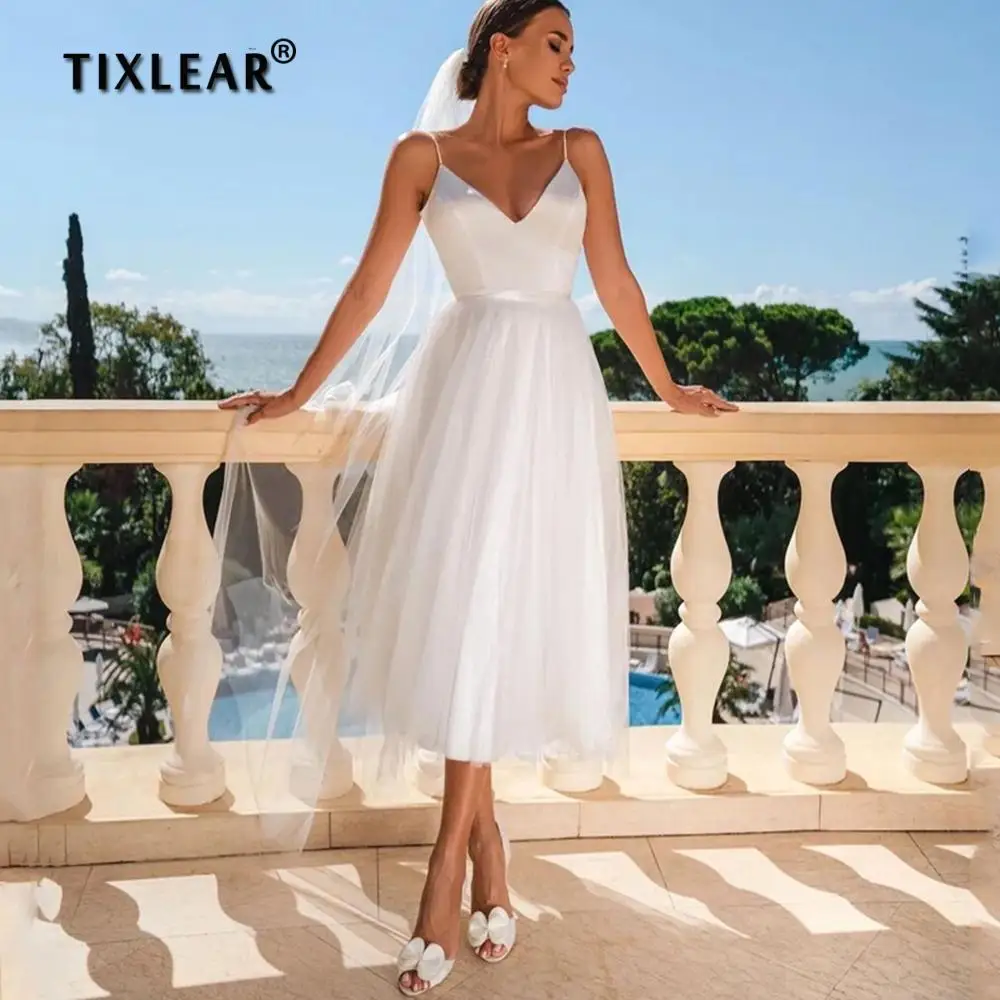 TIXLEAR Sexy V-Neck Short Wedding Dresses For Summer A-Line Spaghetti Straps Open Back Bridal Gowns For Women 2022 Custom Made
TIXLEAR Sexy V-Neck Short Wedding Dresses For Summer A-Line Spaghetti Straps Open Back Bridal Gowns For Women 2022 Custom Made