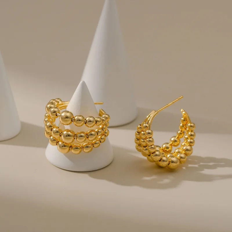 European Three Row Metal Ball Beaded Female Earrings 18K Gold Plated CC Shaped Hoop Earring Fashion Women Party Accessories 
European Three Row Metal Ball Beaded Female Earrings 18K Gold Plated CC Shaped Hoop Earring Fashion Women Party Accessories