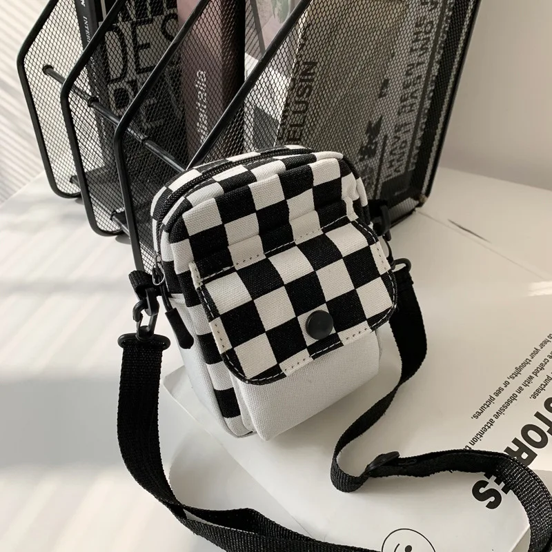 Plaid Small Handbag Female Messenger Bag 2022 New Ins Niche Personality Wild Student Canvas Shoulder Small Square Bag
Plaid Small Handbag Female Messenger Bag 2022 New Ins Niche Personality Wild Student Canvas Shoulder Small Square Bag