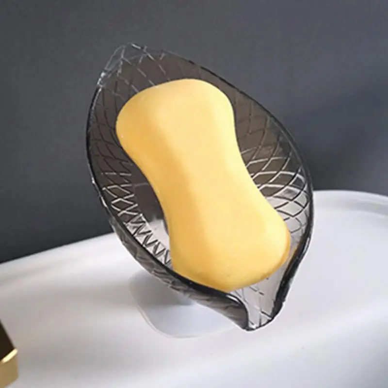 Creative Soap Box Non Perforated Standing Suction Cup Soap Rack Transparent Leaf-shaped Drain Water Soap Dish Laundry Soap Box
Creative Soap Box Non Perforated Standing Suction Cup Soap Rack Transparent Leaf-shaped Drain Water Soap Dish Laundry Soap Box