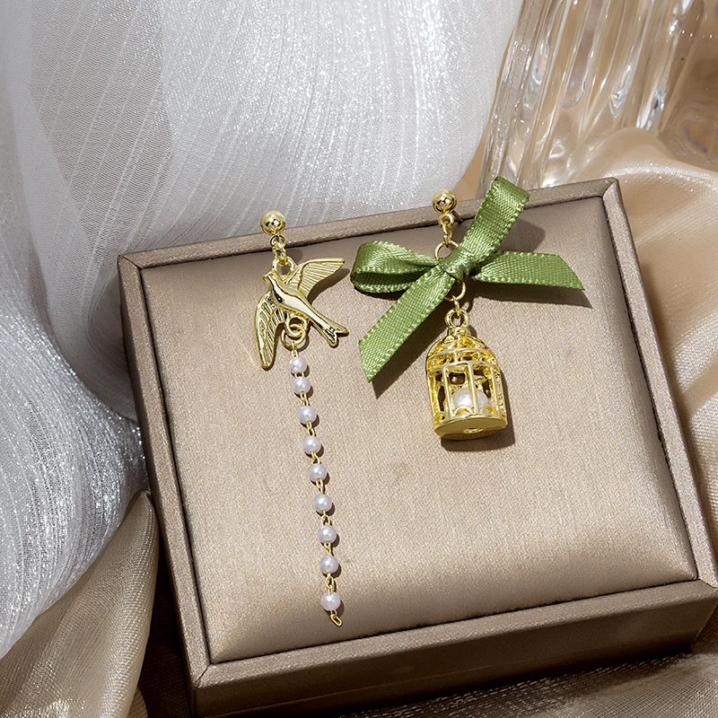 925 Silver Needle Forest Bird Cage Bird Cage Asymmetrical Earrings Tassel Long Bow Pearl Geometric Earrings Jewelry Female
925 Silver Needle Forest Bird Cage Bird Cage Asymmetrical Earrings Tassel Long Bow Pearl Geometric Earrings Jewelry Female