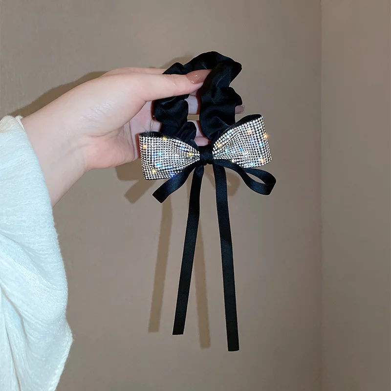 Black Rhinestone Hair Loop Jewelry Bowknot Nylon Tie Elastic Hair Band Long Ribbon Retro Ponytail Headband Smooth Satin Headband
Black Rhinestone Hair Loop Jewelry Bowknot Nylon Tie Elastic Hair Band Long Ribbon Retro Ponytail Headband Smooth Satin Headband