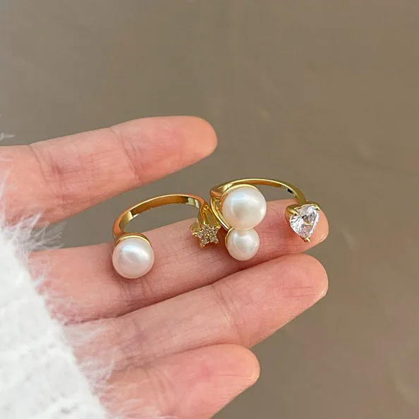Trend Pearl Crystal Star Love Heart Personality Exquisite Creative Open Adjust Gold Finger Rings For Women Party Wedding Gift
Trend Pearl Crystal Star Love Heart Personality Exquisite Creative Open Adjust Gold Finger Rings For Women Party Wedding Gift