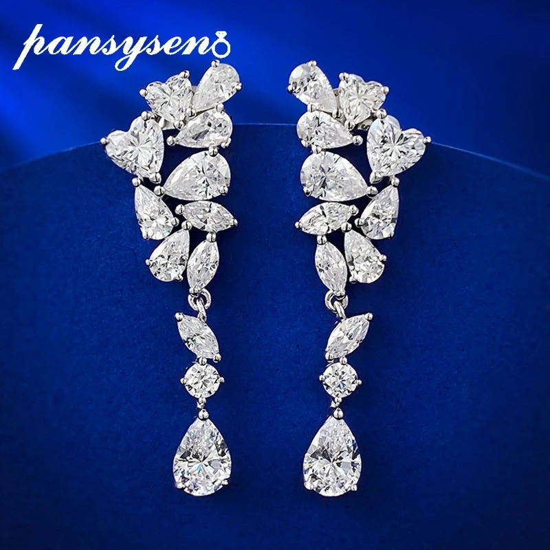 Новинка, классические серьги-подвески PANSYSEN из стерлингового серебра 925 пробы с высокоуглеродистыми бриллиантами с разрезом 1 карат, женские свадебные ювелирные украшения, подарки
Новинка, классические серьги-подвески PANSYSEN из стерлингового серебра 925 пробы с высокоуглеродистыми бриллиантами с разрезом 1 карат, женские свадебные ювелирные украшения, подарки