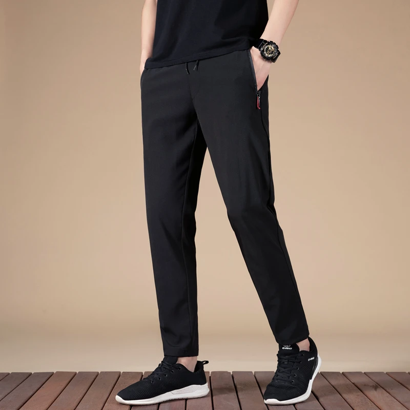 Брюки мужские спортивные тонкие, повседневные Модные дышащие свободные штаны с кулиской, спортивные штаны для бега, весна-лето 
Брюки мужские спортивные тонкие, повседневные Модные дышащие свободные штаны с кулиской, спортивные штаны для бега, весна-лето