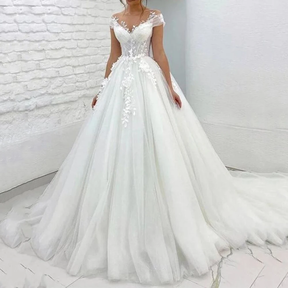 Elegant Tulle Princess Wedding Dress V Neck Sleeveless Lace Applique Button Bridal Dress Buttons Vestido De Noiva
Elegant Tulle Princess Wedding Dress V Neck Sleeveless Lace Applique Button Bridal Dress Buttons Vestido De Noiva