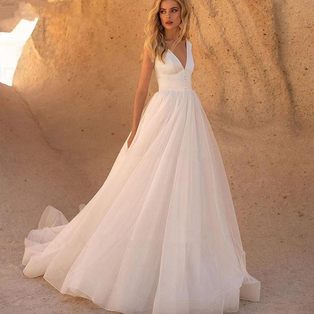 Simple Tulle Wedding Dresses 2022 Deep V Neck Sleeveless Backless A Line White Bridal Gowns Court Train Vestido De Novia Buttons
Simple Tulle Wedding Dresses 2022 Deep V Neck Sleeveless Backless A Line White Bridal Gowns Court Train Vestido De Novia Buttons