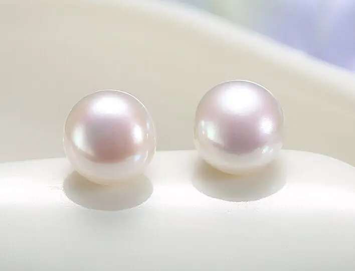 elegant pair of 13-14mm south sea round pearl white stud earring 925s 
elegant pair of 13-14mm south sea round pearl white stud earring 925s
