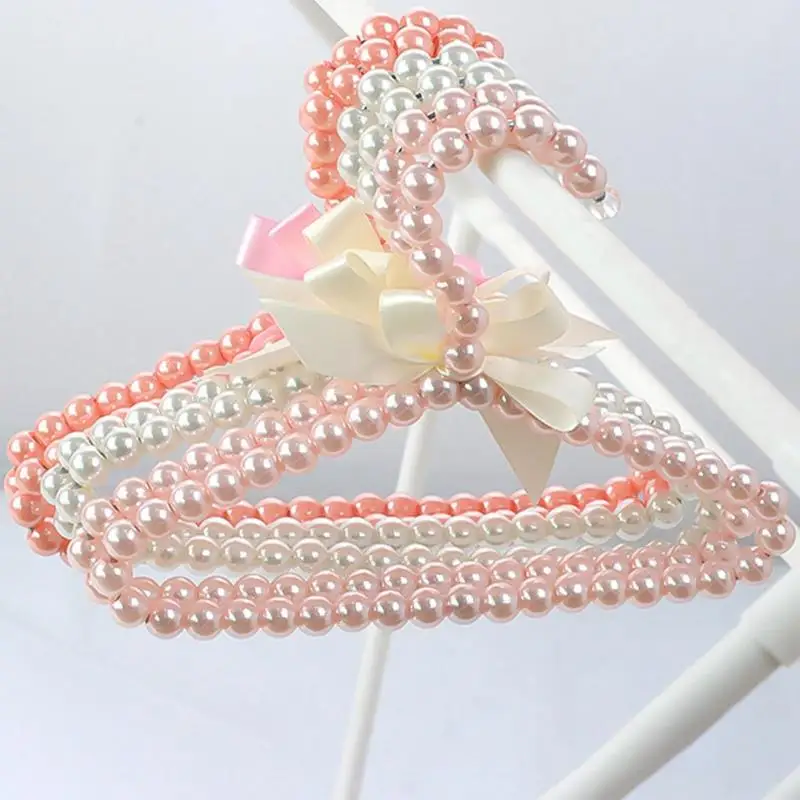 Kids Pet Plastic Hanger Clothes Pearl Baby Hanger Plastic Beaded Bow Dress Coat Hanger Closet Dry Rack Storage Elegant Trouser
Kids Pet Plastic Hanger Clothes Pearl Baby Hanger Plastic Beaded Bow Dress Coat Hanger Closet Dry Rack Storage Elegant Trouser