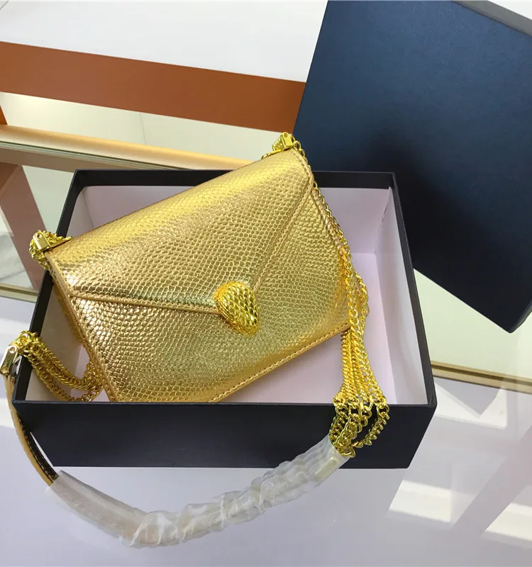 2023 Luxury Metallic Envelope Bag Snake Pattern Purse Snake Metal Lock Heavy Chain Adjustable Shoulder Strap Cross Body Bag
2023 Luxury Metallic Envelope Bag Snake Pattern Purse Snake Metal Lock Heavy Chain Adjustable Shoulder Strap Cross Body Bag