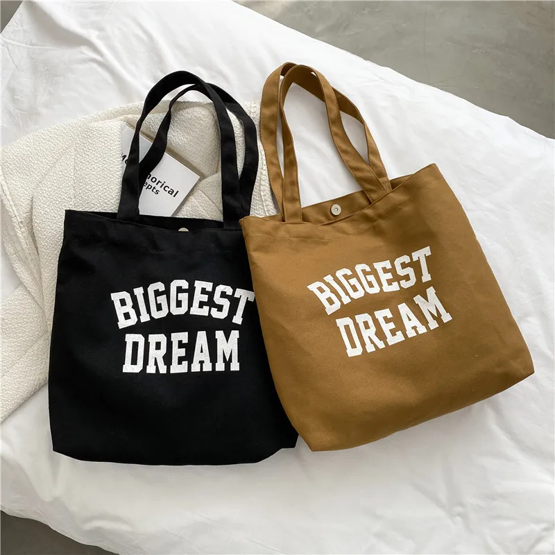 Retro Women's Shoulder Bag Simple Solid Color Letter Print Canvas Bag Women's Buckle Tote Bag Large Capacity Shopping Handbag
Retro Women's Shoulder Bag Simple Solid Color Letter Print Canvas Bag Women's Buckle Tote Bag Large Capacity Shopping Handbag